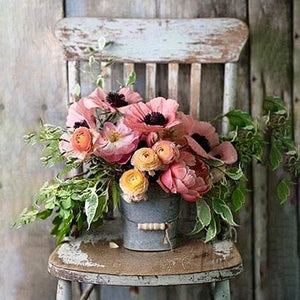 Pink Flowers In A Bucket Jigsaw Puzzle